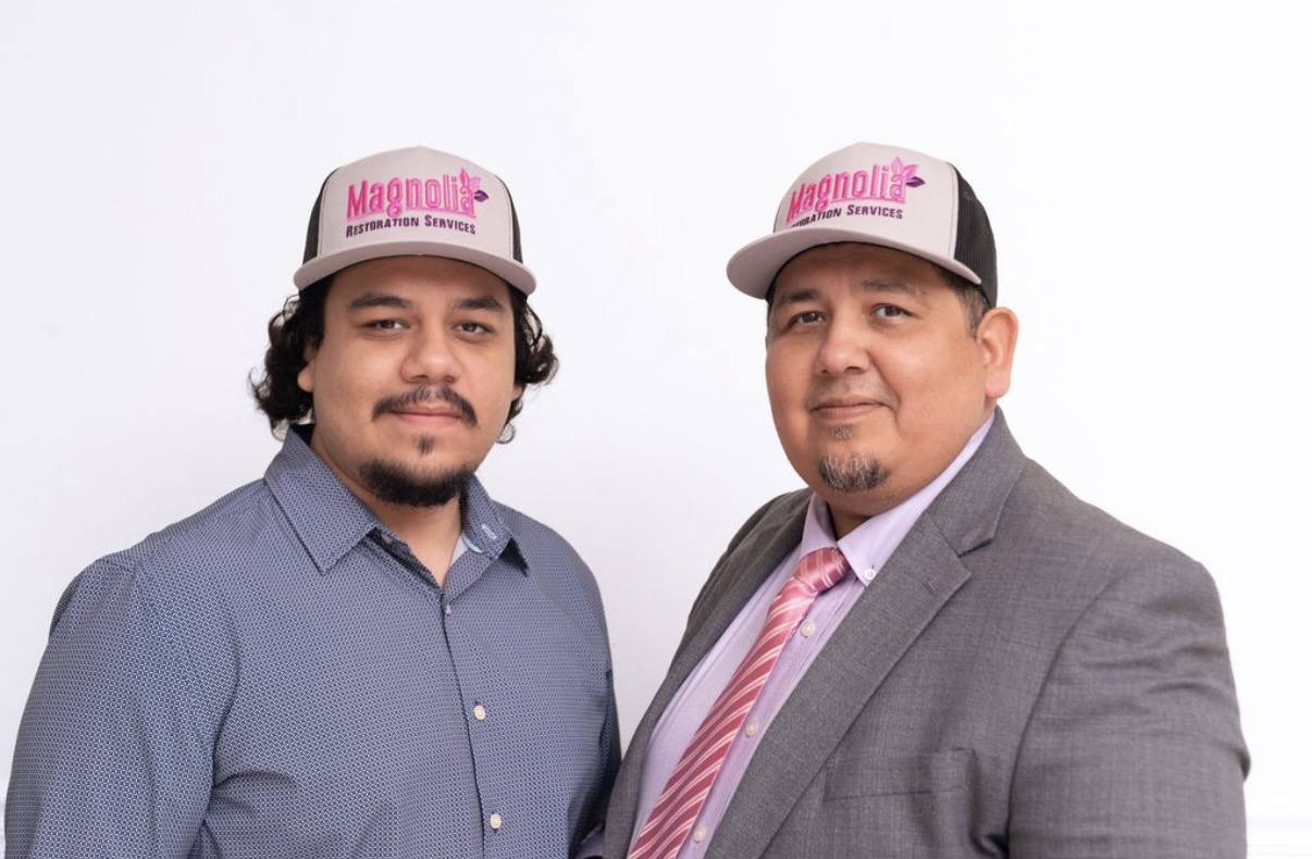 Steven Arreaga Jr. and Steven Arreaga in Magnolia caps